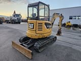 2015 Caterpillar 302.7DCR mini excavator, front three-quarter view