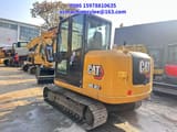 2024 Caterpillar 305.5E2 mini excavator, rear three-quarter view
