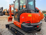 2023 Kubota KX165 mini excavator, rear three-quarter view