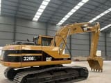 Caterpillar 320BL crawler excavator, side view