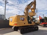 2022 Caterpillar 320GC crawler excavator, rear three-quarter view