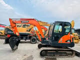 2020 Doosan DX60 crawler excavator, side view