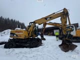 2005 Caterpillar M313C wheel excavator side view