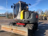 2016 Wacker Neuson EW100 wheel excavator, rear three-quarter view