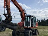 1995 Atlas 1304K excavator, front three-quarter view
