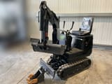 2026 Nuoman 1.2T mini excavator, front three-quarter view
