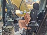 2021 Caterpillar 323 crawler excavator interior cab view