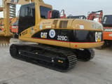 2019 Caterpillar 320CL excavator, rear three-quarter view