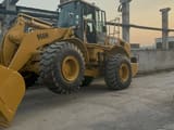 2020 Caterpillar 966H wheel loader, front three-quarter view