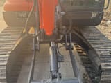 2023 Doosan DX60 mini excavator, rear view of blade and tracks