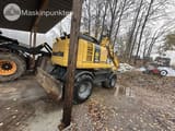 2014 Komatsu PW148-8 wheel excavator rear three-quarter view