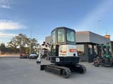 2013 Bobcat E25 mini excavator, rear three-quarter view