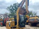 Caterpillar 305.5E mini excavator, rear three-quarter view