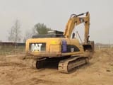 2022 Caterpillar 324D crawler excavator, rear three-quarter view