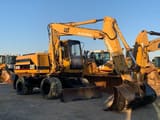 2000 Caterpillar M315 wheel excavator, side profile view