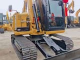 2024 Caterpillar 307E2 mini excavator, front three-quarter view
