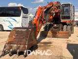 1995 Fiat-Hitachi FH200W.3 wheel excavator, front three-quarter view
