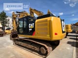 2016 Caterpillar 326F crawler excavator, rear three-quarter view