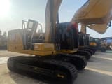 Excavadora de orugas Caterpillar 320CL 2024, vista de perfil lateral