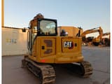 2023 Caterpillar 308 crawler excavator, rear three-quarter view