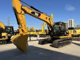 2012 Caterpillar 323D crawler excavator, front three-quarter view