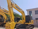 2025 Komatsu PC240LC-7 crawler excavator, front three-quarter view