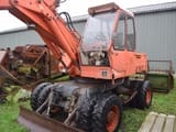 1973 Atlas 1602 wheel excavator, front three-quarter view