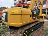 Escavatore cingolato Caterpillar 320D2 del 2019, vista posteriore tre quarti