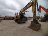 2018 Caterpillar M320F wheel excavator, front three-quarter view