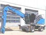 2019 Fuchs MHL320F material handler, side view