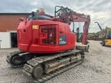 2019 Komatsu PC138US crawler excavator, rear three-quarter view