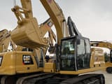 2024 Caterpillar 320GC crawler excavator, side view