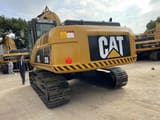2016 Caterpillar 325D crawler excavator, rear three-quarter view