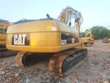 Caterpillar 325C crawler excavator, rear three-quarter view