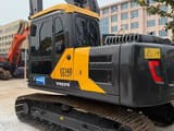 2025 Volvo EC140 crawler excavator, rear three-quarter view