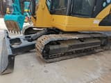 2013 Caterpillar 306D crawler excavator, side view of undercarriage and blade