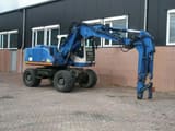 2002 Atlas 1404 wheel excavator side view