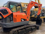 2022 Doosan DX60 crawler excavator, side view