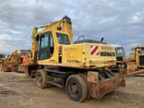 1998 Komatsu PW170ES wheel excavator, rear three-quarter view