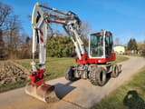 2020 Takeuchi TB295W wheel excavator, front three-quarter view