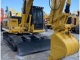 2024 Komatsu PC130 crawler excavator, front three-quarter view