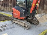 2022 Kubota KX027-4 mini excavator, side view