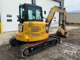 2018 Caterpillar 305.5E mini excavator, rear three-quarter view