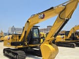 2022 Caterpillar 312D2 GC excavator, front three-quarter view