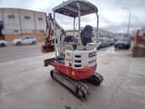2019 Takeuchi TB215R mini excavator, rear three-quarter view
