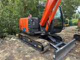 2024 Hitachi Zaxis 60 mini excavator, rear three-quarter view