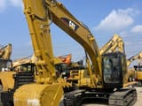 2024 Caterpillar 320CL paletli ekskavatör, ön çapraz görünüm