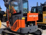 2025 Hitachi ZX55 mini excavator, rear three-quarter view