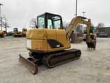 2013 Caterpillar 306 mini excavator, rear three-quarter view