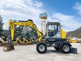 2017 Wacker Neuson EW100 wheel excavator side view